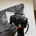 Modern black leather handbag featuring silver stud accents and a metal buckle closure - Black without Pendant