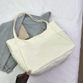 White canvas tote bag with large blue abstract graphics and shoulder straps - Off White