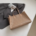 Chic khaki laser-cut tote bag with hollow geometric pattern and pebble leather texture - Khaki