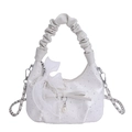 White bucket bag with bow and pearl details, sparkling finish, and cloud-shaped handle - White