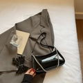 Chic black patent leather shoulder bag with sleek silver chain and crossbody strap - Black