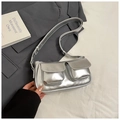 Detail of silver Y2K metallic shoulder bag with two front pockets and adjustable strap - Silver