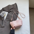 Minimalist light pink leather crossbody bag for women with elegant golden hardware details - Pink Without Pendant