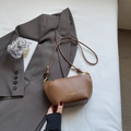 Brown faux leather crossbody cloud bag with drawstring pleats and gold branding - Brown No Pendant