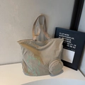 Minimalist beige canvas tote bag with green cat print and matching small coin purse - Off White