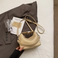 Detailed macro view of beige lychee texture leather with metal buckle and strap - No Pendant / Khaki