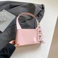 Pink mirrored leather underarm bag with silver metallic studs for a trendy punk style - Pink