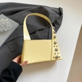 Chic cream yellow handbag with silver rivet detailing for women's fashion 2025 - Yellow