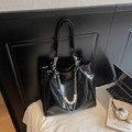 Glossy black patent leather tote bag with silver chain and white pearl handle detail - Black