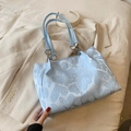 Light blue jacquard tote bag with heart patterns and elegant silver metal ring handles - Blue Without Charm