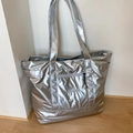 Metallic silver large tote bag with padded texture and front zipper for women's daily commute - Silver