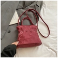 Elegant burgundy pleated bucket bag in suede texture with woven detail and adjustable strap - Wine Red Without Pendant