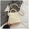 Cream pleated bucket bag with dual cylindrical handles and adjustable shoulder strap - White Without Pendant