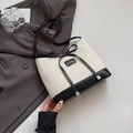 Stroh-Stofftasche mit schwarzen Lederakzenten und dekorativem Schleifendetail - Schwarz