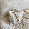 White quilted drawstring bucket bag with fringe texture and pearl chain details - Off White