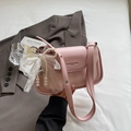 Pink faux leather shoulder bag with white pearl and lace bow charm detail - Pink