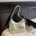 Minimalist mint green oversized tote bag with pleated texture and plush cloud pendant - Green