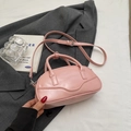 Chic pink PU leather bowling handbag for women with adjustable shoulder strap and top handle - Pink Without Pendant