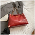 Borsa trapuntata in pelle rossa con tracolla a catena dorata e chiusura a girello - Rosso
