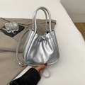 Silver metallic pleated cloud bag with adjustable shoulder strap and gold logo - Silver