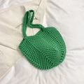 Detailed macro view of vibrant green crochet texture and handmade woven cotton material - Green