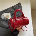 Solid red cylindrical leather Boston bag with silver lettering and adjustable strap - No Pendant / Burgundy