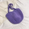 Detailed close-up of purple hand-woven crochet tote bag showing thick textured knit patterns - Purple