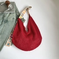 Red knit hobo shoulder bag with colorful floral embroidery strap for beach vacations - Red