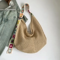 Beige woven crochet tote bag featuring colorful flower embroidery on the shoulder strap - Khaki