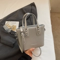Silver metallic textured bucket bag with adjustable shoulder strap and dual top handles - Silver No Pendant