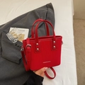 Chic red bucket bag with vertical texture, silver studs, and adjustable strap for women - Wine Red Without Pendant
