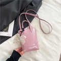 Pale pink faux leather tote bag with white floral charm and adjustable strap - Pink With Pendant