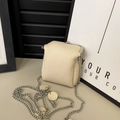 Chic cream mini lipstick purse in lychee pattern leather with silver chain strap - White