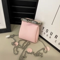 Pink lychee grain mini lipstick bag with silver kiss-lock closure and metal chain strap - Pink