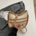 Bolso saco de punto en beige y marrón con correas de cuero y detalles metálicos plateados - Blanco & Caqui