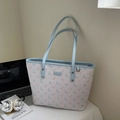 Lightweight printed tote bag with deer silhouettes and star patterns in soft pastel blue - Blue
