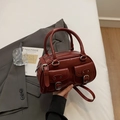 Retro burgundy leather handbag with double front pockets and adjustable shoulder strap - Burgundy
