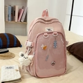 Detalle de mochila escolar rosa con bolsillo transparente y lindo colgante de oso - Rosa Con Muñeco