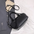 Minimalist black lychee pattern leather tote bag with stylish knot handle and strap - Black
