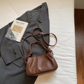 Chic brown litchi pattern pleated handbag with adjustable shoulder strap on grey suit - Brown No Pendant