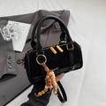 Mini black velvet cylindrical boston bag with leather trim and wooden bead charm - Black with Pendant