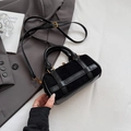 Minimalist black leopard Boston bag with suede stitching and golden metal hardware - Black without Pendant