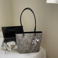 Gray floral jacquard tote bag with black leather handles and metallic charms - With Charm / Black