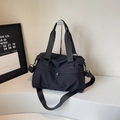 Große schwarze Reisetasche aus Nylon mit verstellbarem Schultergurt und Doppelring-Zippern - Schwarz
