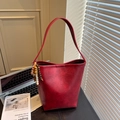 Deep red vintage leather bucket tote bag with decorative multicolored wooden bead charm - With Charm / Red