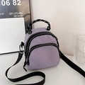 Mini lila Nylon Umhängetasche mit Doppel-Reißverschluss und Griff mit geometrischem Muster - Lila