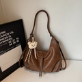 Brown vintage hobo bag in textured leather with white plush bear charm and straps - With Charm / Caramel color