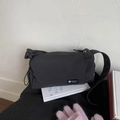 Water-resistant dark grey shoulder bag with adjustable strap and casual pillow shape - No Pendant / Black