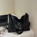 Vintage black leather tote bag with retro metal hardware and spacious commute design - Black