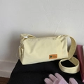 Water-resistant beige shoulder bag with orange outdoor label and zipper closure - No Pendant / Yellow